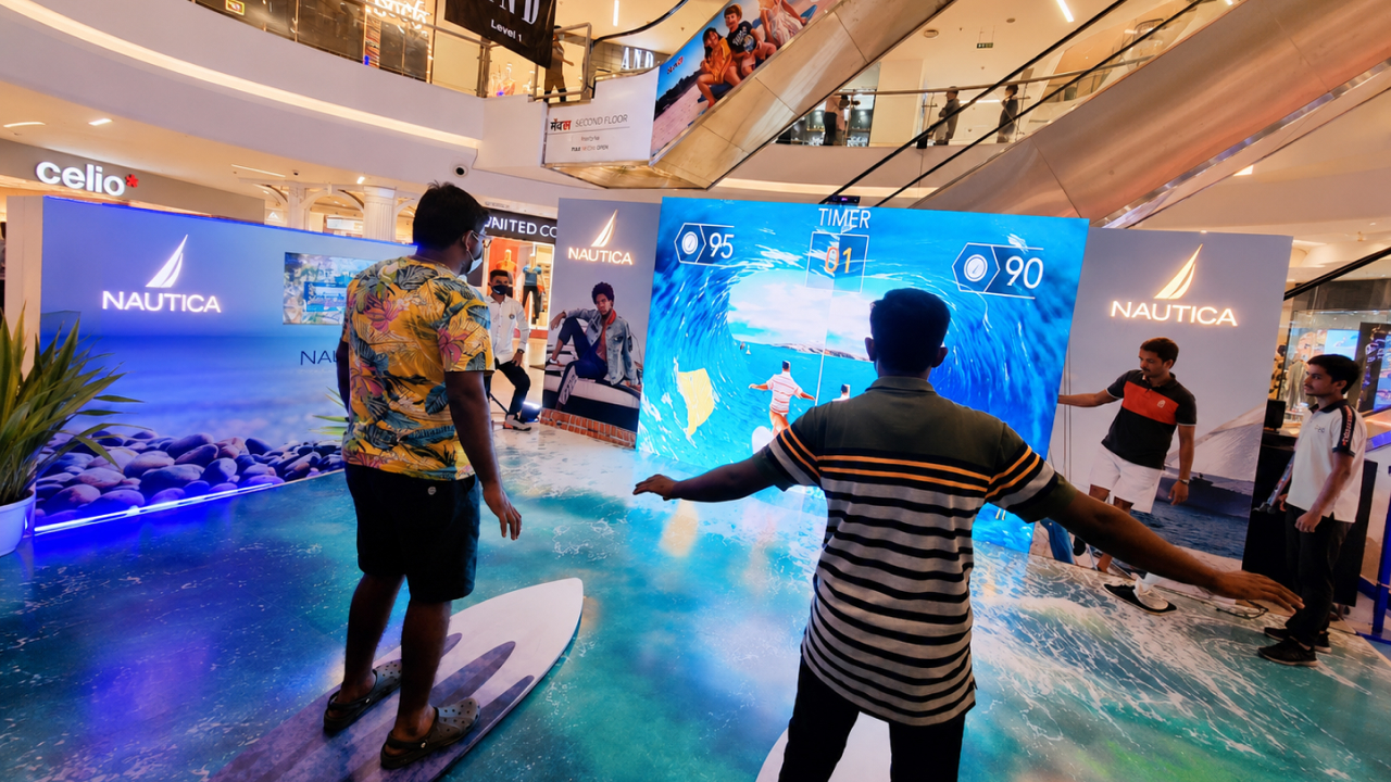 motion-sensor boards at Nautica pop-up activation, fully immersed in the wave experience
